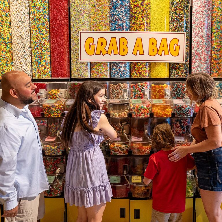 guests at Amazing Mirror Maze Escape's candy store