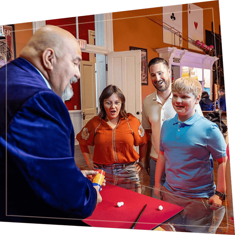 Magic Saloon guests watching magic trick