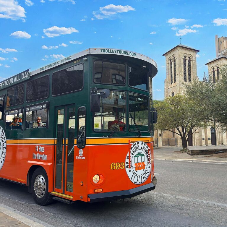 San Antonio trolley driving past San Fernando Cathedral